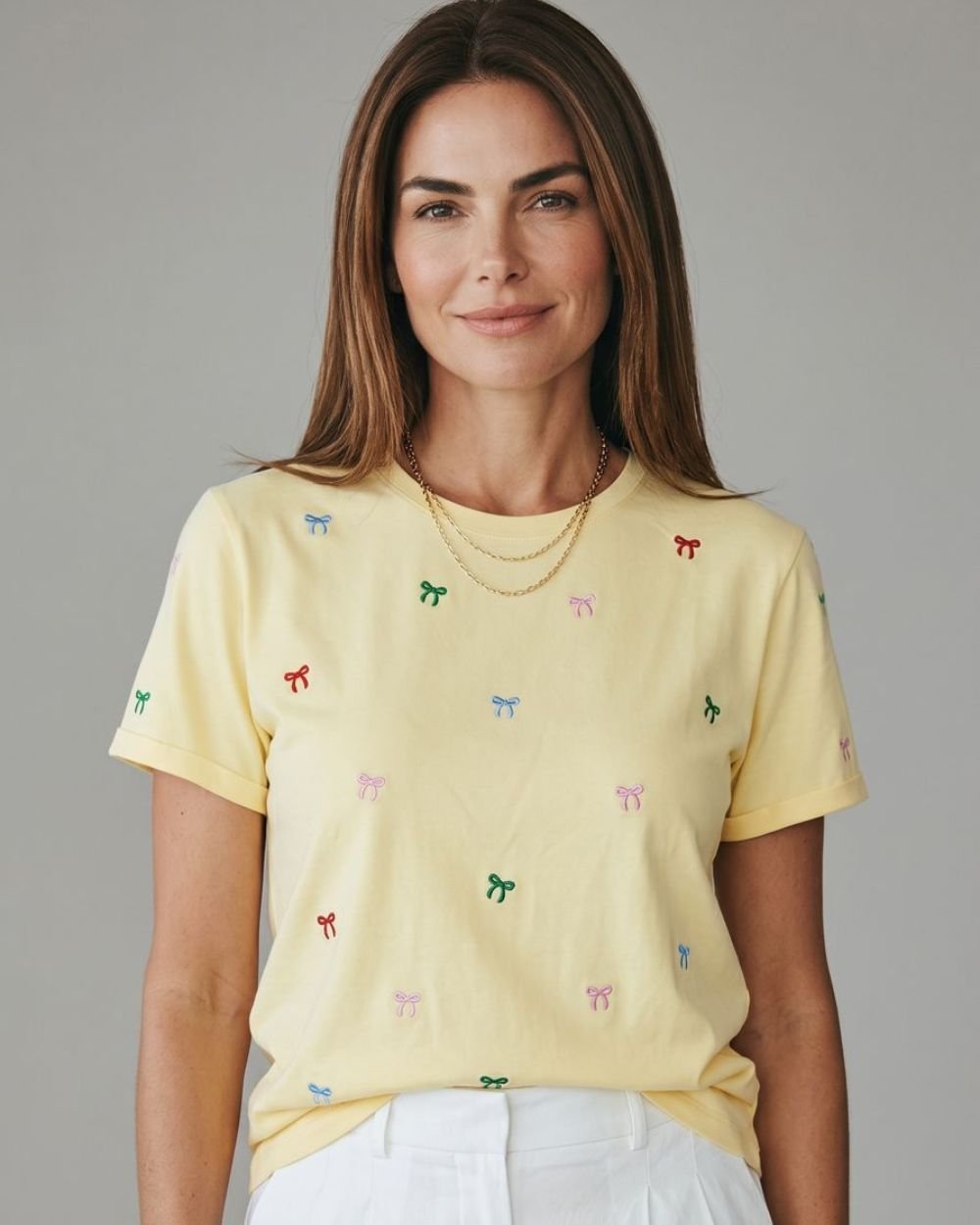 CAMISETA LARGA BORDADA LAZOS